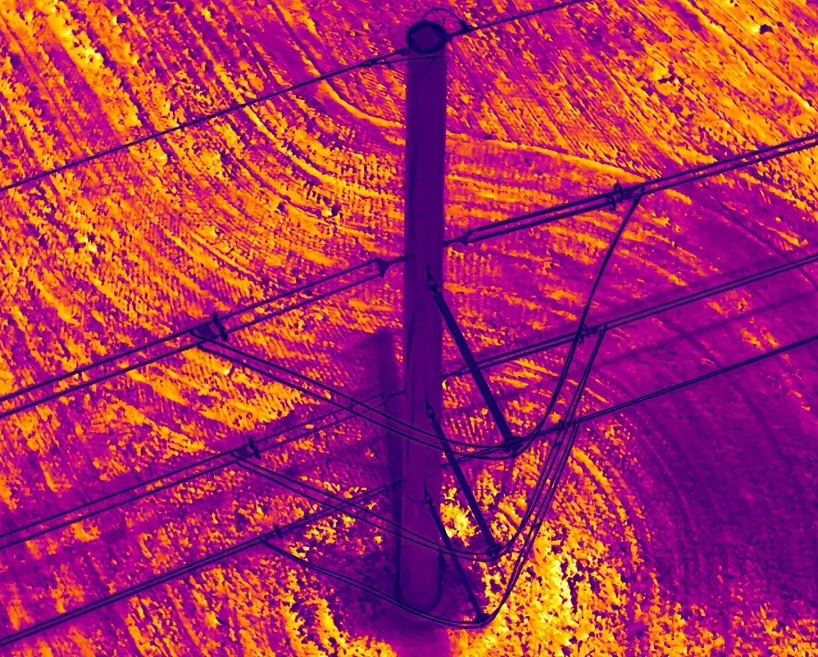 Thermal drone overview of energized utility structure